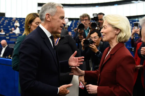 FILE- Canada's Prime Minister Mark Carney, front left, speaks with European Commission President Ursula von der Leyen at the European Parliament in Strasbourg, eastern France, Thursday, Sept 17, 2026. (AP Photo/Pascal Bastien, File)