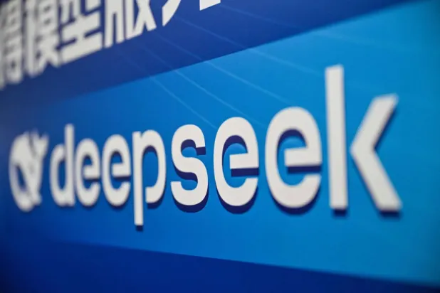  The logo of DeepSeek is seen during the Global Developer Conference, organized by the Shanghai AI Industry Association in Shanghai on February 21, 2025. (AFP) 