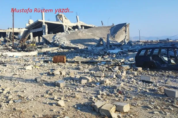 Humus kırsalındaki el-Kusayr kentinde Hizbullah’a ait tahrip olmuş bir karargâh (Independent Arabia)