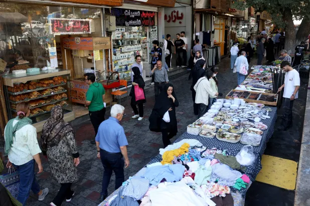 People shop at Tajrish Bazaar in northern Tehran, Iran, 30 September 2026. Iran is facing an economic crisis as the conflict between the US and Iran continues. (EPA)