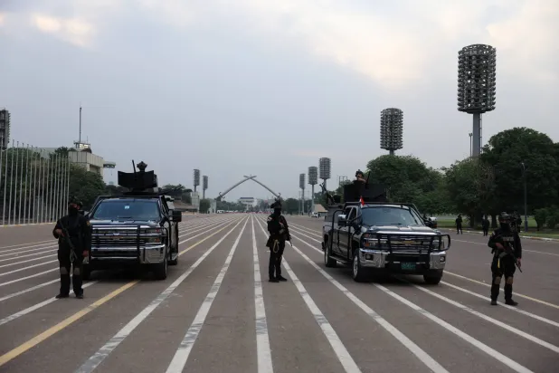 Members of the Iraqi security forces stand guard near the Victory Arch monument during preparations for Sovereignty Day celebrations, marking the withdrawal of US-led coalition forces from Iraq, in Baghdad, Iraq, October 2, 2026. (Reuters)