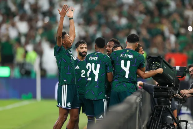 همام الهمامي يحتفل بهدف التقدم أمام منتخب الإمارات (تصوير: عدنان مهدلي) 