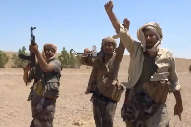 A handout photo made available by the Southern Giants Brigades media office shows pro-government fighters holding positions during an offensive against Houthi positions in a coastal area of Taiz province, near the Bab al-Mandeb Strait, Yemen, 06 October 2026. EPA