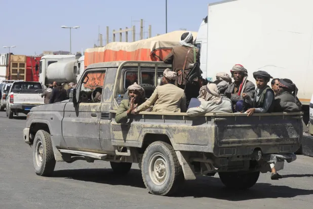 Houthi fighters ride in a pickup truck on a street, in Sanaa, Yemen, 07 October 2026. (EPA)