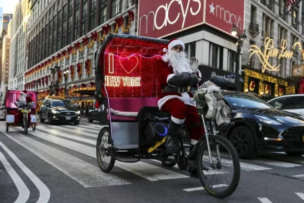 Pedicabs operate throughout tourist-rich areas of New York City — ANGELA WEISS / AFP