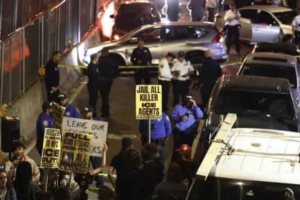 Protesters near the scene where a man was shot by an Immigration and Customs Enforcement (ICE) officer during an operation in the Bronx borough of New York. CHARLY TRIBALLEAU / AFP
