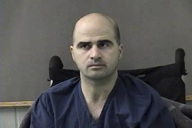 نضال حسن يظهر بعد نقله من مركز بروك الطبي العسكري في سان أنطونيو إلى سجن مقاطعة بيل في بيلتون بولاية تكساس 9 أبريل 2010 (أ.ف.ب)
