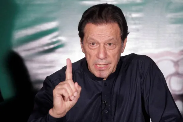 Pakistan's former Prime Minister Imran Khan, gestures as he speaks to the members of the media at his residence in Lahore, Pakistan May 18, 2023. REUTERS/Mohsin Raza
