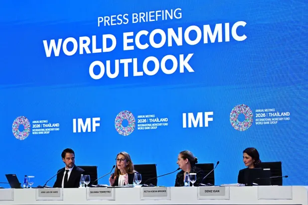 (L-R) IMF Communications Officer Jose Luis De Haro, IMF Chief Economist Silvana Tenreyro, IMF Research Department Deputy Director Petya Koeva Brooks and IMF Research Department Division Chief Deniz Igan attend the World Economic Outlook press briefing at the Annual Meetings of the International Monetary Fund (IMF) and the World Bank Group (WBG) at the Queen Sirikit National Convention Center (QSNCC) in Bangkok on October 13, 2026. (Photo by Lillian SUWANRUMPHA / AFP)