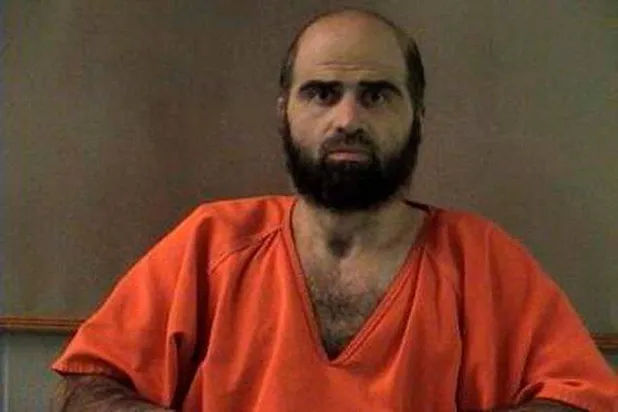 FILE PHOTO: Nidal Hasan, charged with killing 13 people and wounding 31 in a November 2009 shooting spree at Fort Hood, is pictured in an undated handout photo obtained by Reuters on June 29, 2012. REUTERS/Bell County Sheriff's Office/Handout/File Photo
