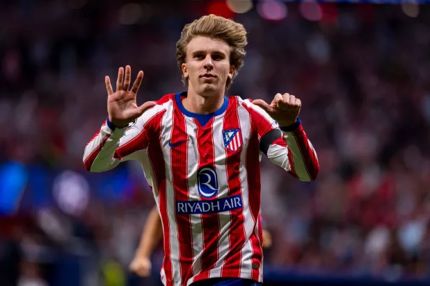  13 October 2026, Spain, Madrid: Atletico Madrid's Pablo Barrios celebrates scoring his side's first goal during the UEFA Champions League soccer match between Atletico Madrid and Manchester United at the Riyadh Air Metropolitano Stadium. (dpa)