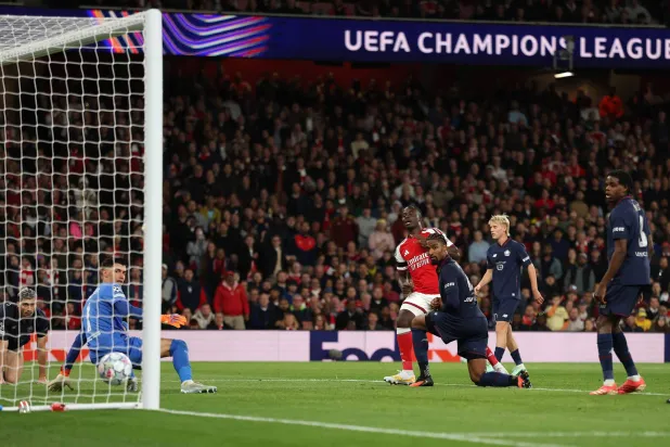 Arsenal's English midfielder #07 Bukayo Saka scores the team's third goal during the UEFA Champions League, league phase football match between Arsenal and Lille at the Emirates Stadium in north London on October 13, 2026. (AFP)