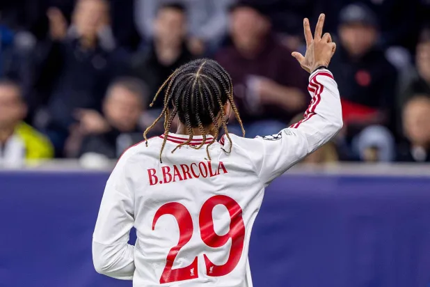 Liverpool's French midfielder #29 Bradley Barcola celebrates scoring the 1-5 goal, his hattrick, during the UEFA Champions League football match between LASK and Liverpool FC in Linz, Austria on October 14, 2026. (AFP)