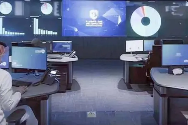 Employees working on computers (National Cybersecurity Authority). 
