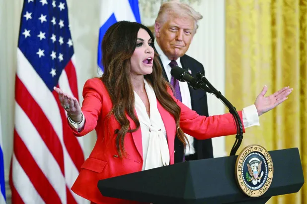 (FILES) Kimberly Guilfoyle, President Trump's nominee to be the US ambassador to Greece, speaks alongside US President Donald Trump, during a Greek Independence Day celebration in the East Room of the White House in Washington, DC, on March 24, 2025.  (Photo by Brendan SMIALOWSKI / AFP)