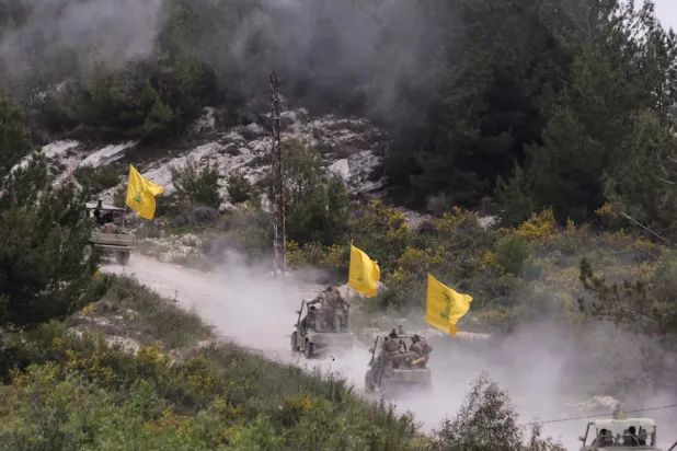 Hezbollah members take part in a military exercise during a media tour organized for the occasion of Resistance and Liberation Day, in Aaramta, Lebanon. REUTERS/Aziz Taher/File photo