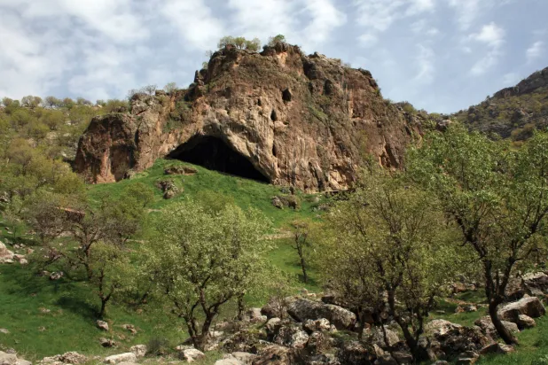 The entrance to Shanidar Cave in Iraq's Kurdistan region, a site of important Neanderthal remains, is seen in an undated photograph released on October 15, 2026. Prof Graeme Barker/Handout via REUTERS