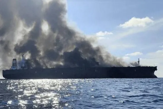 Archive photo of an oil tanker ablaze east of the Strait of Hormuz (Fars)