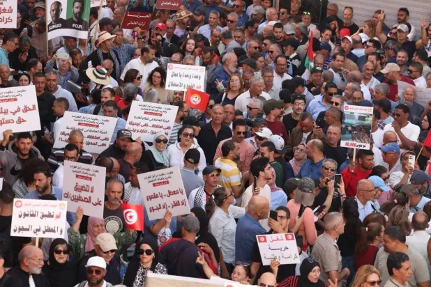 A scene from the mass demonstrations that swept through the streets of Tunisia's capital (EPA)