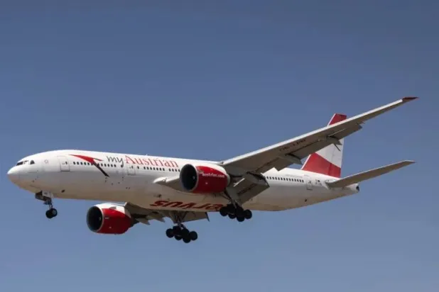 An Austrian Airlines Boeing 777-200ER lands at Los Angeles International Airport (LAX), in Los Angeles, California, on June 14, 2026. (AFP via Getty Images)