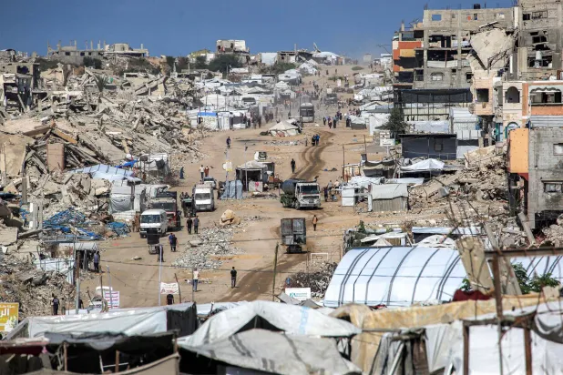 Tents are pictured by the rubble of collapsed buildings in the Jabalia camp for Palestinian refugees in the northern Gaza Strip on October 19, 2026. (AFP)