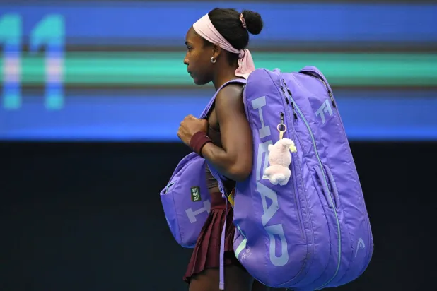 USA's Coco Gauff leaves the court after losing her women's singles match against Belgium's Elise Mertens at the China Open tennis tournament in Beijing on October 7, 2026. (Photo by Adek BERRY / AFP)