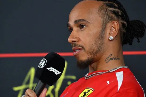 Ferrari's Lewis Hamilton is looking to 'punch out good results' over the next year. ANGELA WEISS / AFP

