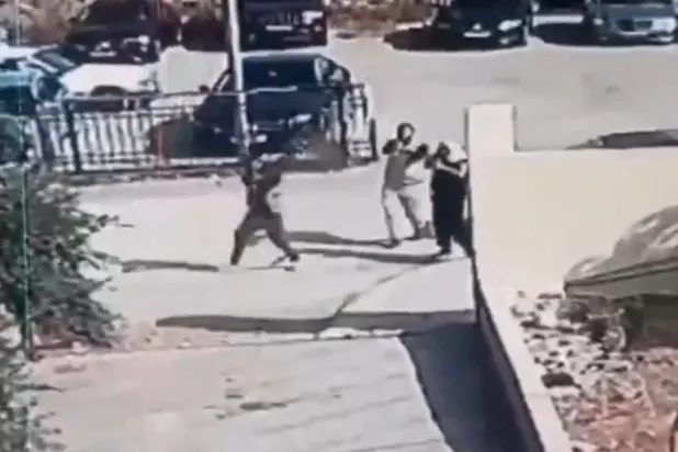 صورة مأخوذة من شريط فيديو للمسلحين خلال هجومهم على الكنيسة في قرية حمود الأردنية