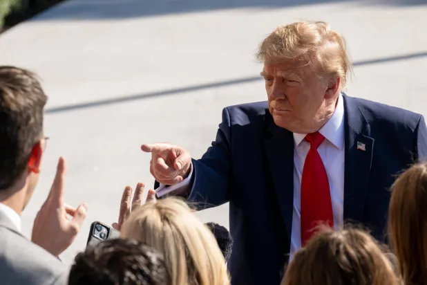  23 October 2026, US, Washington: US President Donald Trump speaks to members of the press before departing the White House for a political rally in Fort Myers, Florida. (dpa)