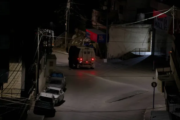 Israeli troops patrol in the West Bank city of Nablus, 24 October 2026. EPA/ALAA BADARNEH