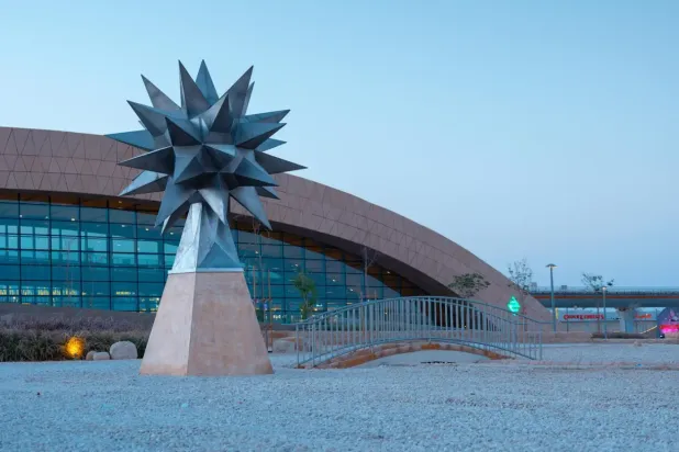 Created by Saudi-based architecture and engineering consultancy Omrania, the Western Metro Station reinterprets desert sand dunes through earth-colored forms that define entrances - SPA