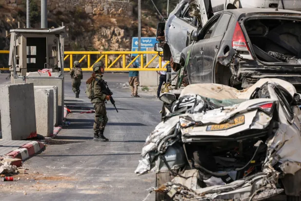 An Israeli checkpoint in Hebron, West Bank, on Saturday (AFP)