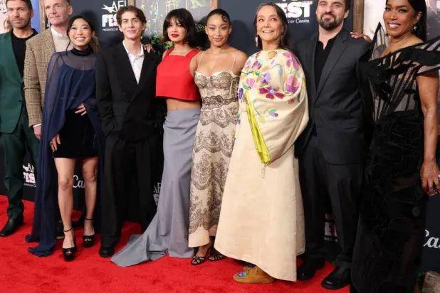 (L-R) 'WIldwood' director Travis Knight joins actors Marc Evan Jackson, Awkwafina, Jacob Tremblay, Peyton Elizabeth Lee, Amandla Stenberg, Tantoo Cardinal, Jake Johnson and Angela Bassett at the premiere. VALERIE MACON / AFP/File
