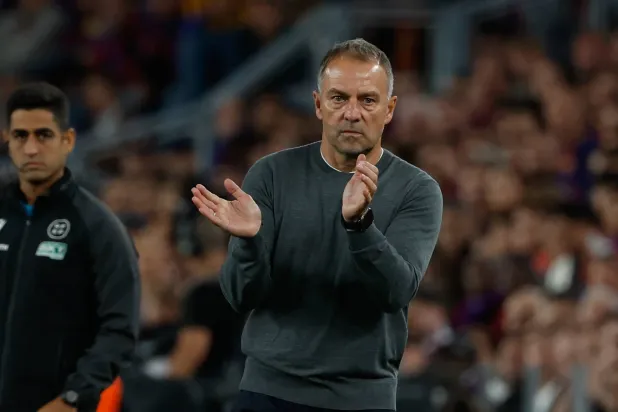  Barcelona's head coach Hansi Flick gestures during a Spanish LaLiga match between FC Barcelona and Real Madrid in Barcelona, Spain, Sunday, Oct. 25, 2026. (AP) 