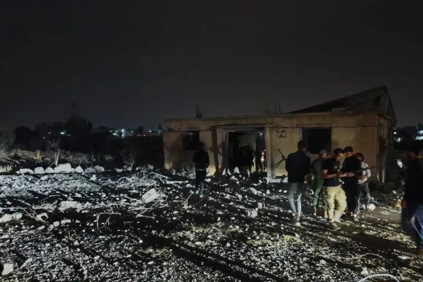 Destruction is seen at the site of the Jordanian strike on Daraa, Syria.