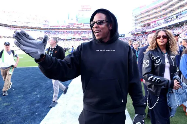 Rapper Jay-Z, shown on the sideline at last season's Super Bowl, will serve as the halftime musical performer at next February's Super Bowl in Los Angeles, the NFL announced. Kevin C. Cox / GETTY IMAGES NORTH AMERICA/AFP/File
