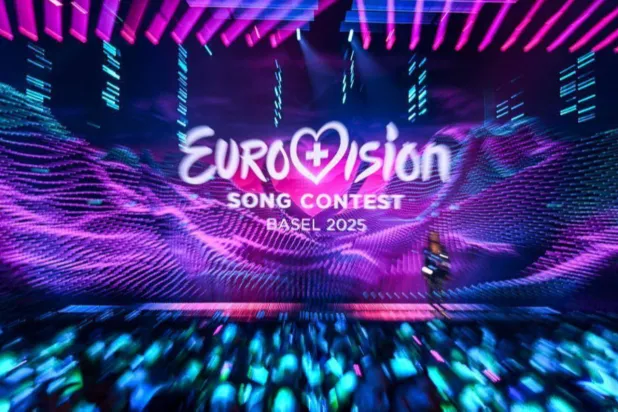The Eurovision Song Contest 2025 logo is displayed on a screen at the end of the dress rehearsal for the second semi-final, Basel, Switzerland, May 14, 2025. (AFP)