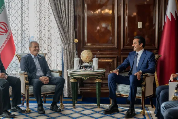 27 October 2026, Russia, Moscow: Qatar's Emir Sheikh Tamim bin Hamad Al Thani meets with Iranian President Masoud Pezeshkian at his residence in Moscow, on the sidelines of the Summit of Heads of State and Government of the Gas Exporting Countries Forum (GECF). (Emiri Diwan Office) 