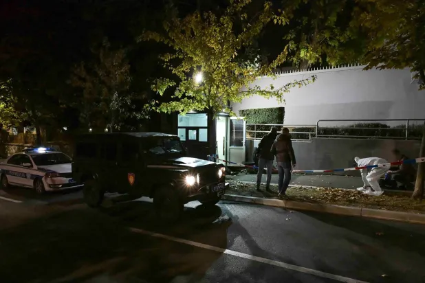 This handout photograph taken and released by Serbia's Interior Ministry on October 28, 2026, shows the scene of an attack on a police officer guarding the Israeli embassy in Belgrade. (Photo by Handout / SERBIAN MINISTRY OF INTERIOR AFFAIRS / AFP) 