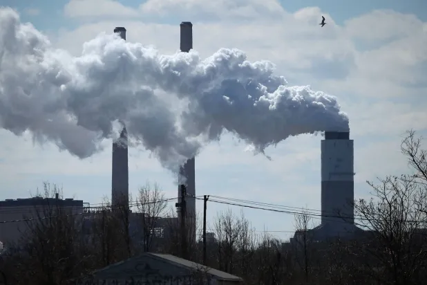 (FILES) Emissions spew from a large stack at the coal fired Brandon Shores Power Plant, on March 9, 2018 in Baltimore, Maryland. (Photo by MARK WILSON / GETTY IMAGES NORTH AMERICA / AFP)