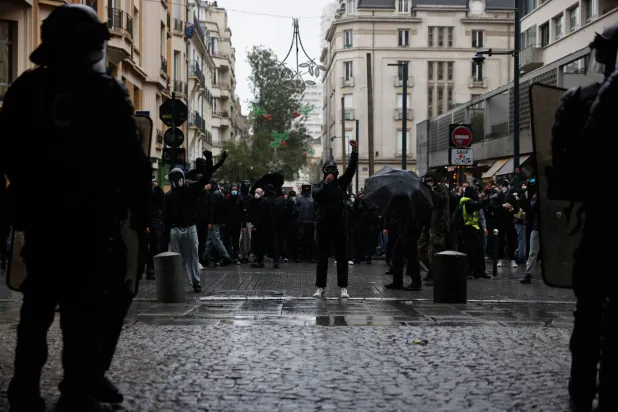 Protesters face police during a demonstration against rising living costs in Rennes, France, Saturday, Oct. 24, 2026. (AP Photo/Jeremias Gonzalez)
