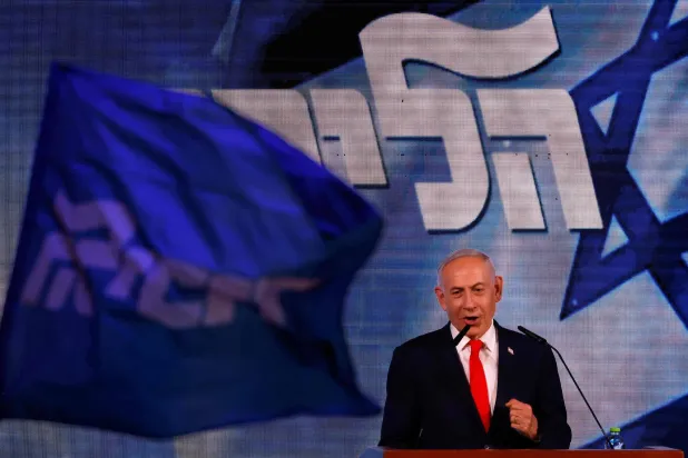 Israel's Prime Minister Benjamin Netanyahu addresses his supporters at the election night rally after the first exit polls were announced, in Jerusalem on early October 28, 2026, during Israel's legislative elections. (AFP)
