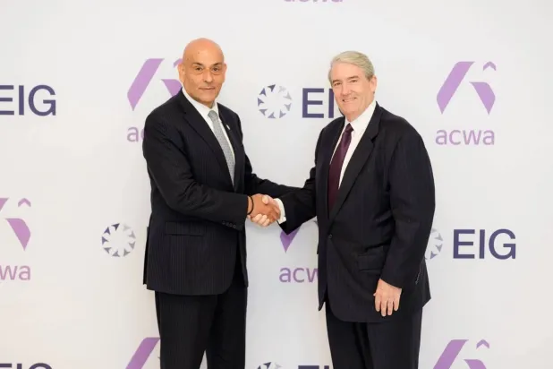 Dr. Samir J. Serhan, Chief Executive Officer of Acwa (left), and R. Blair Thomas, Chief Executive Officer of EIG (right)

