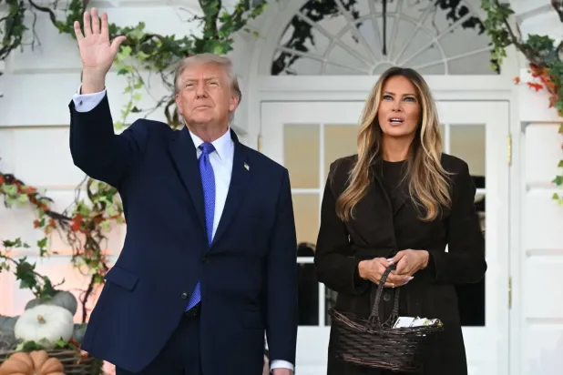 ABD Başkanı Donald Trump ve First Lady Melania Trump (AFP)