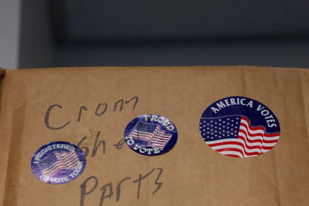  Voting stickers are seen on spare parts boxes in a secure room at the Tom Green County Elections Office in San Angelo, Texas, US October 28, 2026. (Reuters)