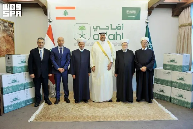 Saudi Ambassador to Lebanon Fahd Al-Dosari, Grand Mufti of Lebanon Sheikh Abdul Latif Derian and other officials are seen at the launch at the Saudi Embassy in Beirut. (SPA)