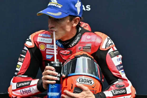 Spanish MotoGP rider Marc Marquez reacts after coming second place in the qualifying session. MOHD RASFAN / AFP
