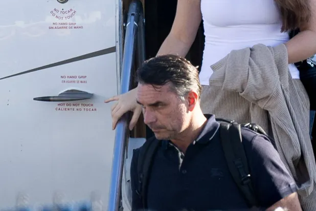 Flavio Bolsonaro steps off a plane after arriving at Opa Locka Executive Airport in Miami, Florida on October 28, 2026. (AFP)