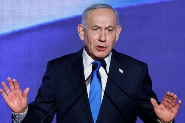 Israeli Prime Minister Benjamin Netanyahu speaks during a toast-raising event hosted by his Likud party, in Tel Aviv, Israel, September 17, 2026. REUTERS/Amir Cohen