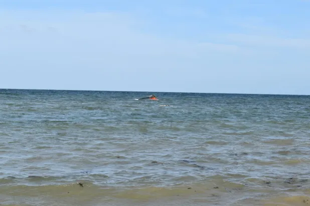  A portion of the vessel floats after it capsized while carrying about 305 people from Djibouti to Yemen. (Kennedy Omondi Okoth/International Organization for Migration/Handout via Reuters) 
